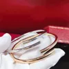 Gouden zilvergouden ketting armband usopen tennis liefde sieraden klassieke nagelbangle sieraden armband 18k gouden unisex paar manchet 316L S1757327