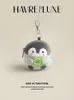 Key Rings Package pendant Four-Leaf Clover Penguin coin purse cute doll plush doll headset storage bag key ornament