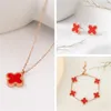 Designer jewelry fashion fourleaf clover suit Pendant Earrings bracelet women039s threepiece wedding banquet whole2987891