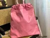 CC Bag outras sacolas grandes volumes mulheres portáteis de mochila portátil Backpack de couro estilista de maquiagem de maquiagem Trendência da bolsa de compras ombro Multifuncional pequeno B