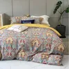 Ensembles de literie de luxe rétro Floral coton quatre pièces ensemble Texture douce pour la peau motif impression vers le bas housse de couette drap-housse