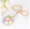 Daisy Flower Keychain Carchain Car Car Ring Bendant Key For Women Women Bag Charm Gift لها لون مختلف للاختيار