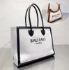 2023 Luxurys Designers väskor Kvinnor Canvas Totes Läder Hot Selling Black Letters Bag bör leda handväskedesigner som säljer Lady Body Chain Coin Purse Tote