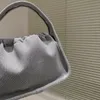 2023 NUEVO Paquete de bolsas de axilas Paquete de textura de tela de punto Bolsa Mujeres Embrague Monedero de cuero Letras inferiores Decoración Sling Pack Tote Carteras femeninas