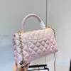 Bolsos de diseñador para mujer Bolso de dama Moda Woc Chainbag Clásico Solapa de negocios Diseñador Bolso de hombro Chica Bolsos de hombro Estilo estrella Carteras de estilo simple Bolsas blandas