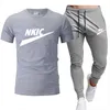 Män spårsräder trycker ut 2 stycken toppar och shorts sportkläder man kläder set kostym mode jogger outfit överdimensionerade män kostym