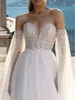 Strand Boho Hochzeitskleid Sweep Zug A-Linie Langarm trägerlos Tüll Schleife 2023 Brautkleider Sexy Pailletten Robe De Mariee