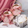 Boîte d'emballage cadeau en marbre en gros boîtes d'emballage de bonbons en papier boîte-cadeau hexagonale créative avec poignée fournitures de remerciement pour fête de mariage Caja De Regalo De Marmol