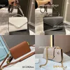 Skórzana torba na ramię saffiano cahier koperta worek wiadomości prad trójkąt torebki metalowe Pochette Designer luksusowe lady cross body torebki