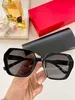 Женские солнцезащитные очки для женщин Мужчины солнцезащитные очки. Мужчина стиль моды защищает глаза UV400 со случайной коробкой и корпусом 558