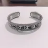 Braccialetti in acciaio inossidabile di design con polsino retrò Bracciale a doppia lettera con serpente per gioielli Hip Hop da uomo