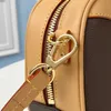 Designer La nuova borsa a tracolla serie 45528 Squisita disposizione di tela intrecciata Bordo con pelle antica Rivelando il fascino retrò
