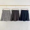 Skirts Kuzuwata Spring Temperament Woman Skirt High Waist All match Mini Female Retro Plaid Short Faldas Mujer 2023 Trendy 230302