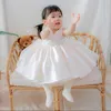 Robes de fille 2023 robe de princesse blanche pour bébé filles enfants perles sans manches Bowknot robes de bal robes de demoiselle d'honneur pour la fête de mariage formel W0224