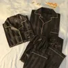 Kobietowa odzież snu Mężczyźni i kobiety piżamy, gdy wysokiej jakości lekki luksusowy jedwabny kardiganowy kombinezon z długim rękawem shangbing jedwabnej para gospodarstwa domowego do 230303