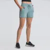 Pantaloncini da donna ad alta elasticità con tasche Abbigliamento attivo Bottino da allenamento Esercizio da palestra Pantaloncini da yoga Leggings sportivi tinta unita