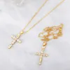 Hanger kettingen Flola Cross ketting voor vrouwen koper CZ White Stone Gold Chain Crystal Plated Christian Jewelry NKEZ39