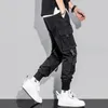 Herenbroek Joggers mannen Fashion Hip Hop Cargo Streetwear Mens Heatpants Militaire stijl Wide been Traptringbroek Lange linten