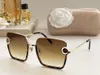 Femmes lunettes de soleil pour femmes hommes lunettes de soleil hommes mode Style protège les yeux UV400 lentille avec boîte aléatoire et étui 2185