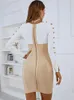 Casual klänningar kvinnor vinter sexig långärmad lapptäcke vit beige botton mini bodycon bandage klänning 2023 elegant fest scenprestanda