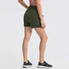 Pantaloncini da donna ad alta elasticità con tasche Abbigliamento attivo Bottino da allenamento Esercizio da palestra Pantaloncini da yoga Leggings sportivi tinta unita