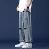 Herrbyxor rippade jeans mens 2023 sommar lösa breda ben beskurna koreanska trendiga modemärken raka manliga klädbyxor
