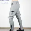 Km0w 2023 Mode Sports Marque Asr' V Pantalons pour hommes Casual Long Jogging Lâche Respirant Impression Vêtements d'entraînement Kgzb272W