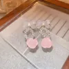 Boucles d'oreilles pendantes Lovelink mignon doux Transparent Rose acrylique Rose fleur pour les femmes mode arc fille coréen accessoire