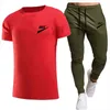 Neue sommer männer Trainingsanzüge rundhals T-shirt hosen sport anzug männer kurzarm hemd beiläufige sport anzug Marke LOGO Drucken