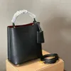 2021 бренд роскошная сумка ковша черная р Home Panier Diagonal Bag Sags Tote Знаменитые дизайнерские треугольники знак мини -ковш сумки269Z