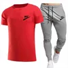 Neue sommer männer Trainingsanzüge rundhals T-shirt hosen sport anzug männer kurzarm hemd beiläufige sport anzug Marke LOGO Drucken