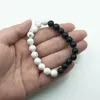 Bracelet de perles en plastique noir et blanc Strand Bijoux à la main pour hommes