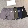 Designer-Shorts, kurze Herren-Jogginghose mit Intranet, über dem Knie, tiefer Schritt, Reißverschluss, weiße Sticketiketten, kurze Strandhose