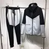 Herrspåriga kvinnliga teknikfleece pant spårdräkt Klassisk skarvkontrast kamouflage ljusrockar jackor topp design kvinnor casual coat xxl