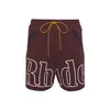 Menshorts Rhude med modellstorlek S-XL Designer Summer Fashion Beach Pants Män högkvalitativ gata bär svart rödbrun grön menlpm