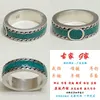Factory wholesale 2023 New Luxury High Quality Fashion Jewelry for The ancient enamel is decorated with bright green interlocking double woven piping ring