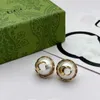 Usine de gros 2023 nouveau luxe de haute qualité bijoux de mode pour Double demi-pièce perle en laiton argent aiguille polyvalent boucles d'oreilles femme