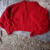 Malha feminina feminino suéter ultra-curto casaco 2023 outono de inverno manga longa colheita de malha solta cortes de cor sólida