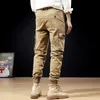 Męskie dżinsy mody streetwear Men Khaki kombinezon multi kieszenie swobodne spodni ładunki szalki hip -hop joggery szerokie spodnie nogi