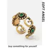 95% OFF 2023 New Luxury High Quality Fashion Jewelry for Summer gift ancient family Ring Emerald with gold hollow out metal texture light extravagant open ring