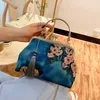 Totes Style Cheongsam Bag Women's Elegant Nip Hand Classic Antique som bär mors väskor Pures Designer Handväskor Kvinnor