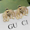 Bijoux de luxe de haute qualité petite colle d'abeille laissant tomber la conception de strass boucles d'oreilles aiguille en argent français