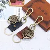 Keychains Charm Men Leather Keychain Vintage Metal Flower Key Chains Fashion Women Keyring Female Car Bag Pendant Jewelry Accessories Gift