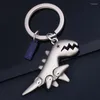 Keychains 2 färger Valfri Creative Söt dinosaurie Key Chain Gun Black Nickel Bronze Metal Pendant Ring Moveble Bag Keychain