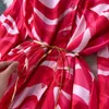Camicette da donna Autunno Europa e Stati Uniti Moda Stampa tie-dye Design di nicchia allentato Senso Collo alto Manicotto a lanterna