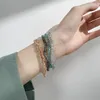 Strand pärlstav strängar meetvii trendig triangel kristallpärla armband söta oregelbundna sträckpar armband för kvinnor tjej inte22