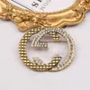 Europese en Koreaanse eenvoudige familie geometrische decoratieve broche gepersonaliseerde diamant ingelegde accessoires zijden sjaal broche hoogwaardige luxe sieraden