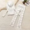 Juicy Trainesuit Womens İki Parçalı Marka Takipleri Altın Lettered Baskı Kapşonlu Düzenli Üstler Dantelli Joker Pantolon Moda Tasarımcı Kadın Giysileri 9 Renk 777ess