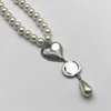 60% de réduction 2023 Nouveaux bijoux de luxe de haute qualité pour femmes avancées avec perles et cœur, double collier en laiton, chaîne de pull polyvalente pour femmes