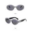 Occhiali da sole rotondi di moda occhiali da sole occhiali designer marchio black metal telaio lenti in vetro scuro per donne da uomo